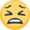 Tired Face emoji on Facebook